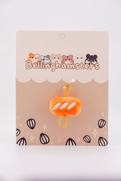 Plush bread loaf accessory for Bellinghamsters with hand loops for carrying in one or both paws