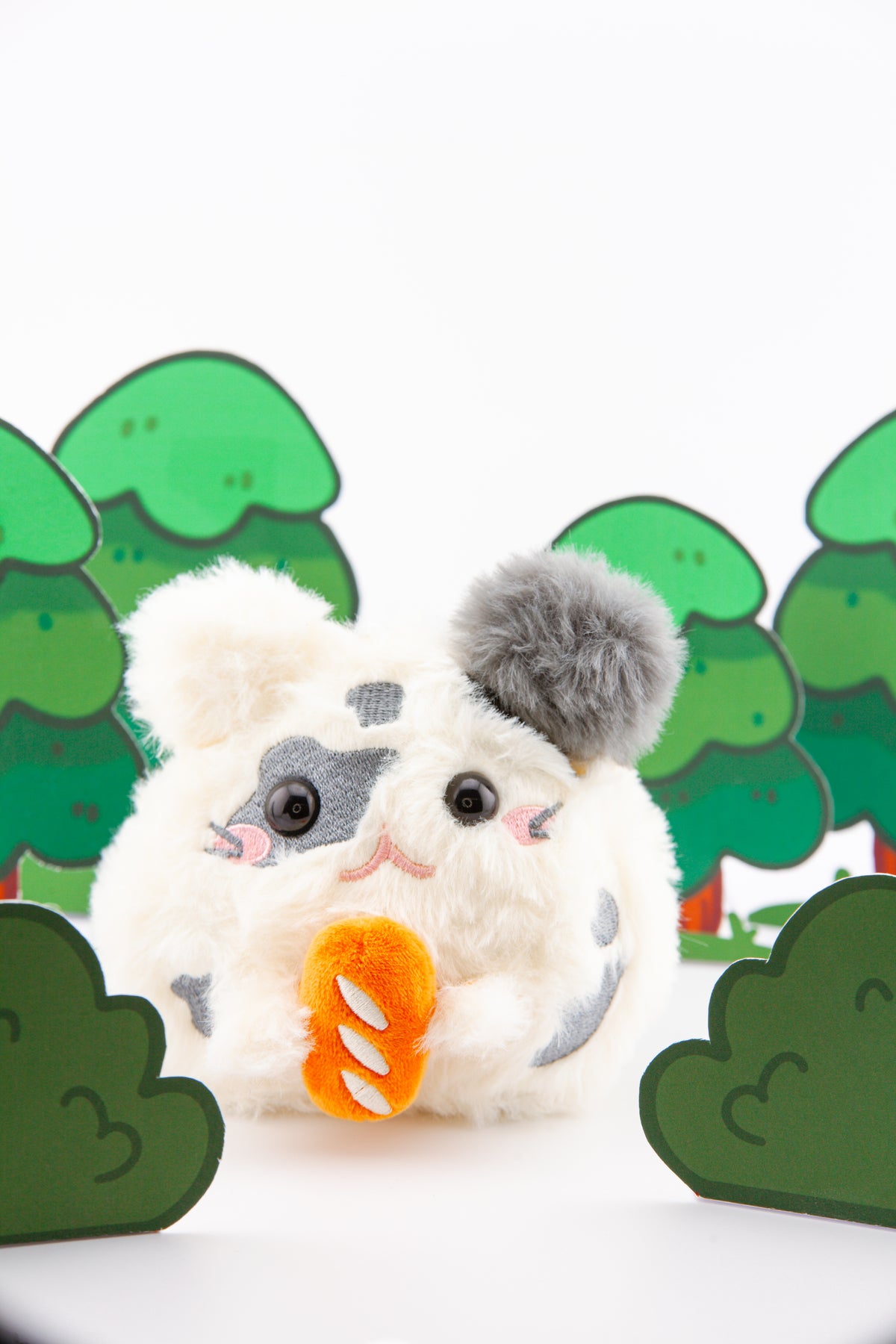 Bellinghamster holding plush bread loaf accessory with hand loops for carrying in one or both paws
